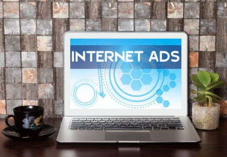 Shipping professional reviewing targeted digital advertising and data privacy risks
