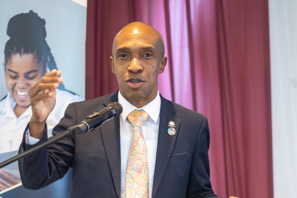 Speaker addressing the CMU maritime research event at a microphone.