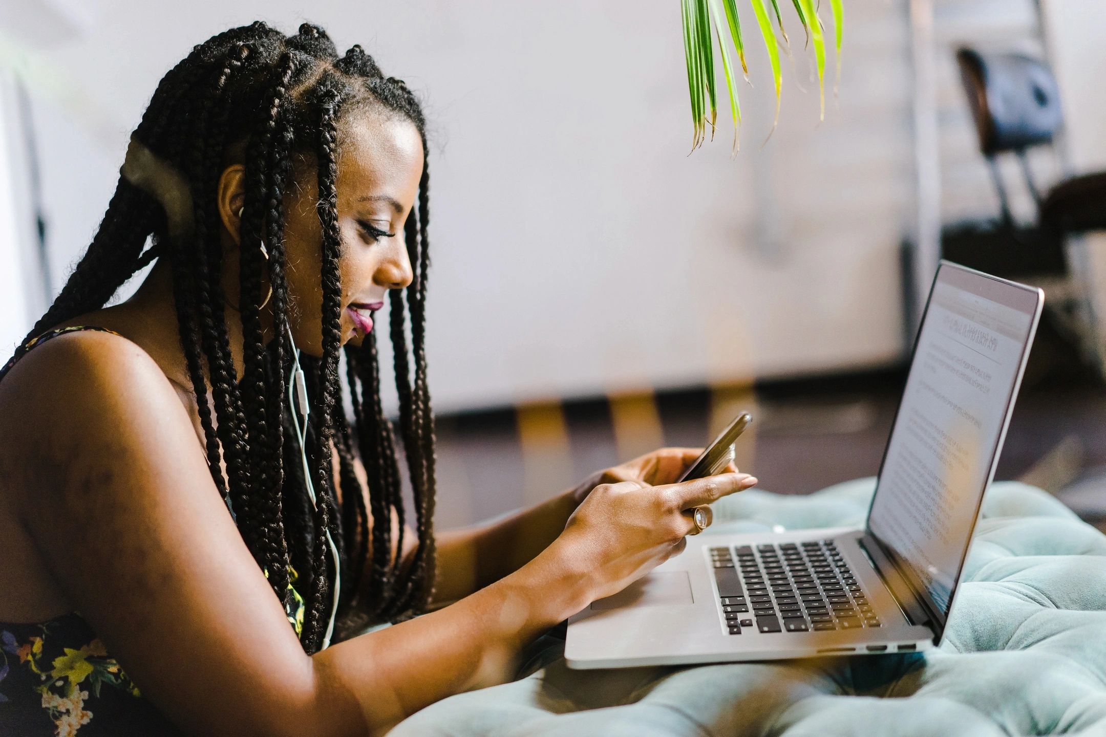 Cybersecurity professional reviewing phishing threats on a laptop